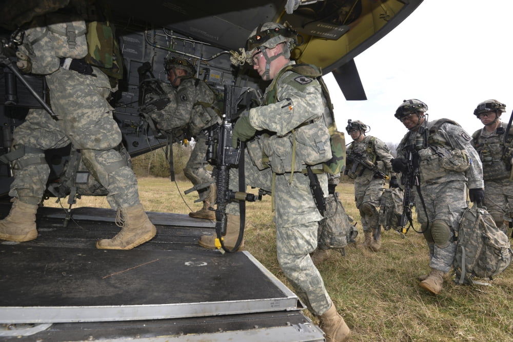 US Army paratroopers board a CH-47 Chinook Canvas Art - Stocktrek Images (34 x 23)