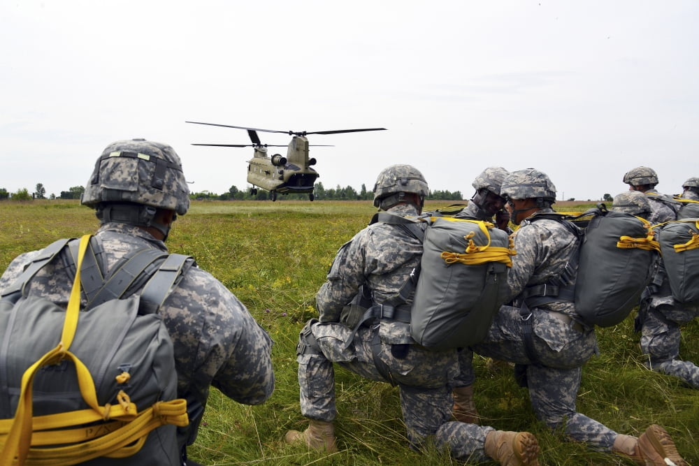 US Army paratroopers prepare to board a CH-47 Chinook Canvas Art - Stocktrek Images (34 x 23)