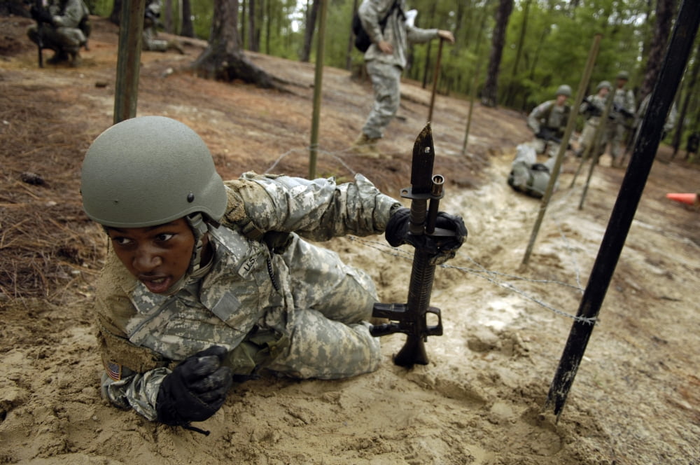 A US Army recruit negotiating the confidence course during basic combat training at Fort Jackson South Carolina Canvas Art - Stocktrek Images (34 x 23)