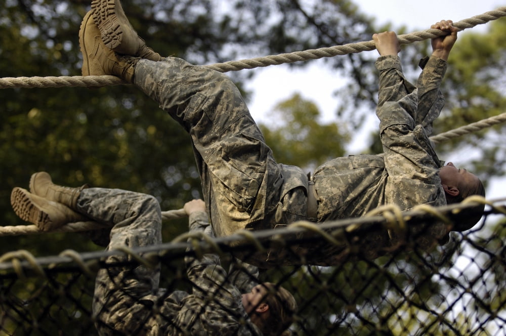 US Army recruits shuffling down a rope obstacle during basic combat training at Fort Jackson South Carolina Canvas Art - Stocktrek Images (34 x 23)