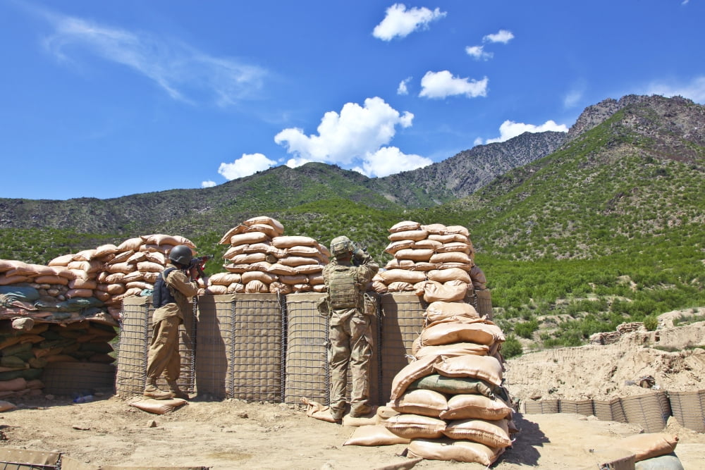 US Army soldier and an Afghan security guard provide security Canvas Art - Stocktrek Images (35 x 23)