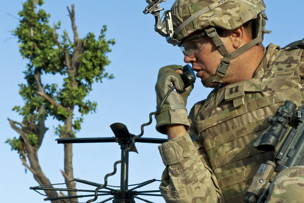 US Army soldier calls for indirect fire following an enemy attack Canvas Art - Stocktrek Images (35 x 23)