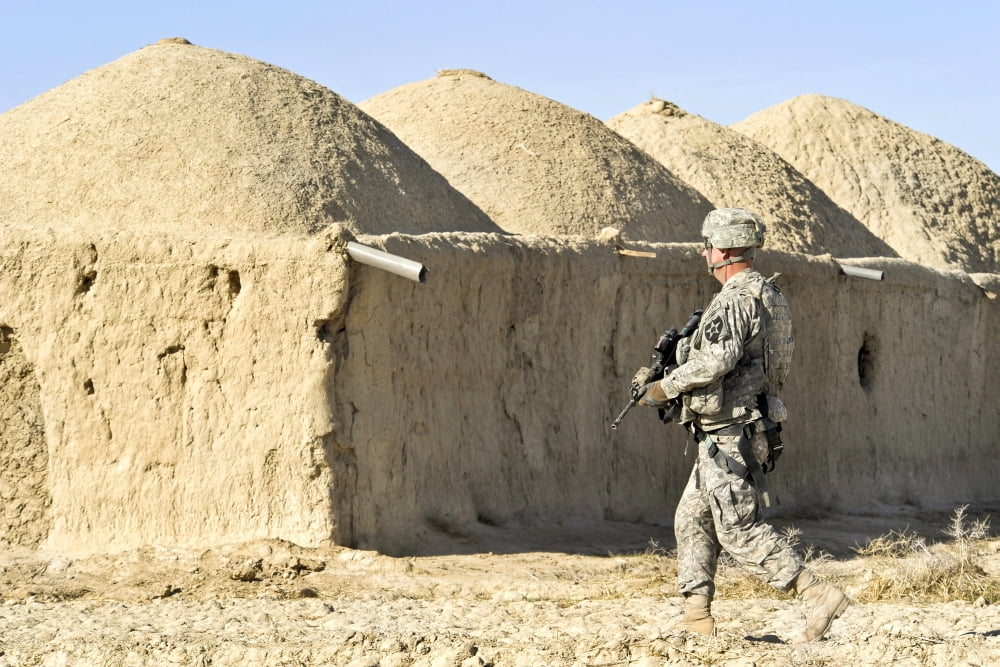 US Army soldier conducts a dismounted patrol in Helmand province Afghanistan Canvas Art - Stocktrek Images (34 x 23)