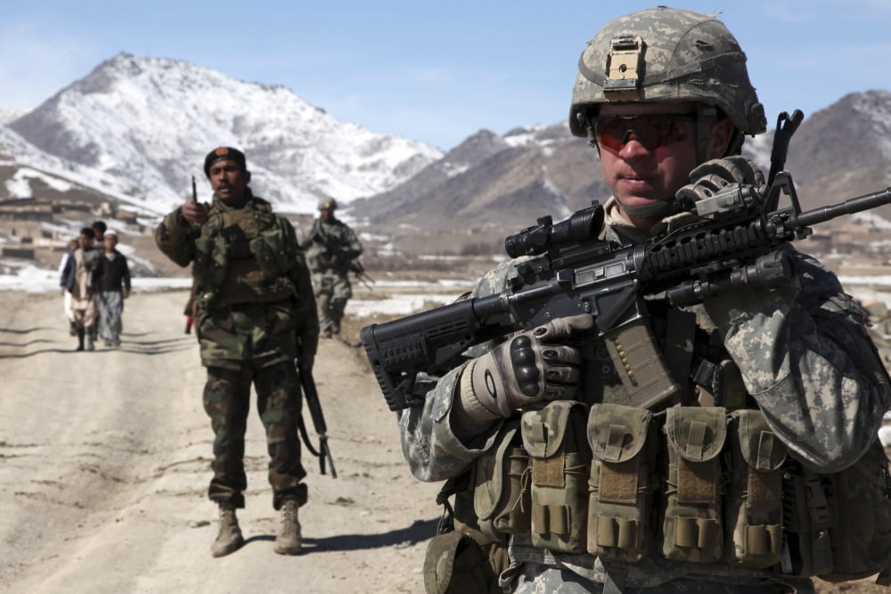 US Army soldier conducts a patrol with a platoon of Afghan National Army soldiers Canvas Art - Stocktrek Images (35 x 23)