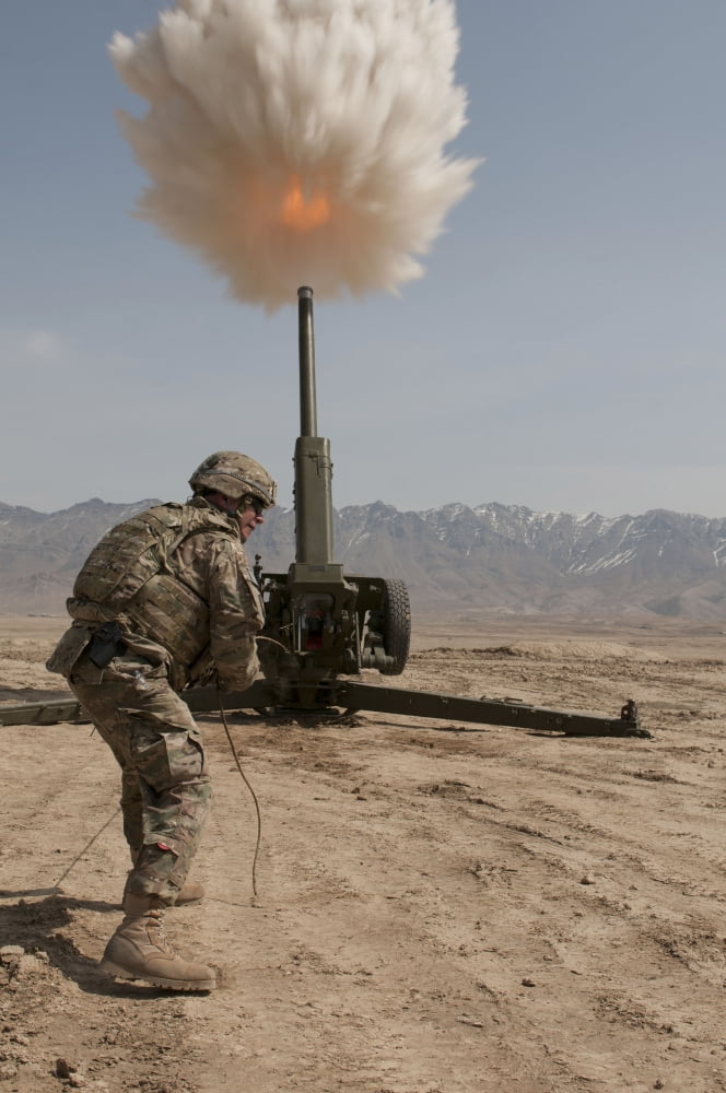 US Army soldier fires a 122mm howitzer Canvas Art - Stocktrek Images (23 x 35)