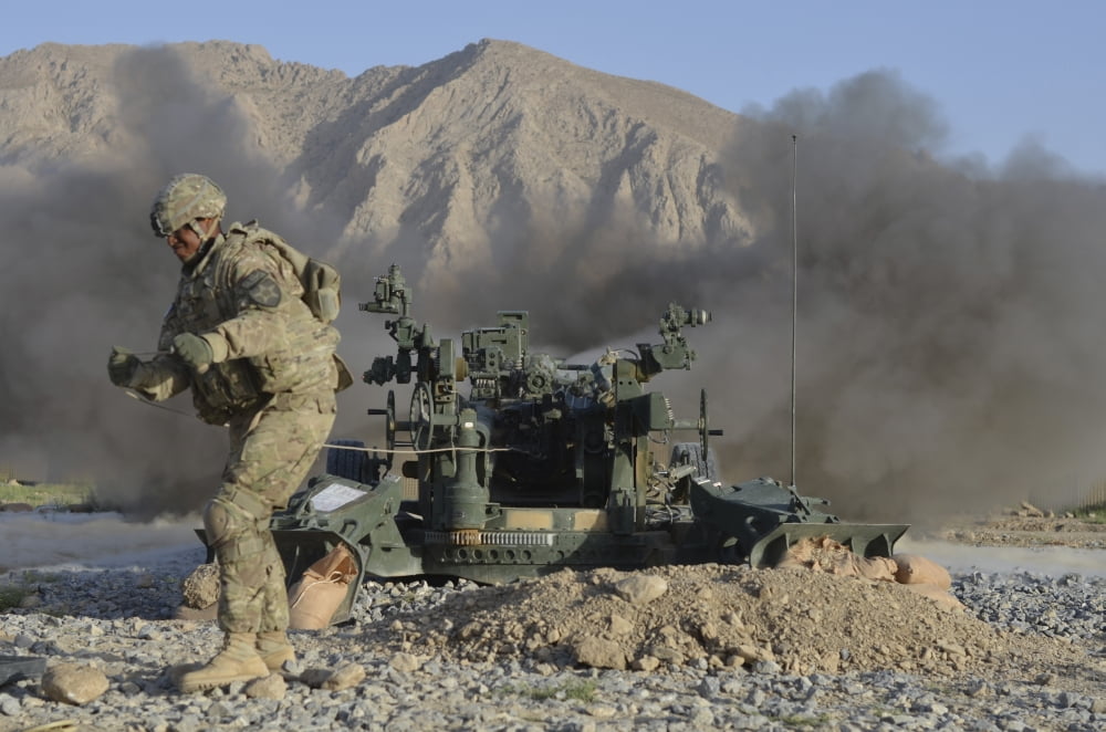 US Army soldier fires an M777 howitzer Canvas Art - Stocktrek Images (34 x 23)