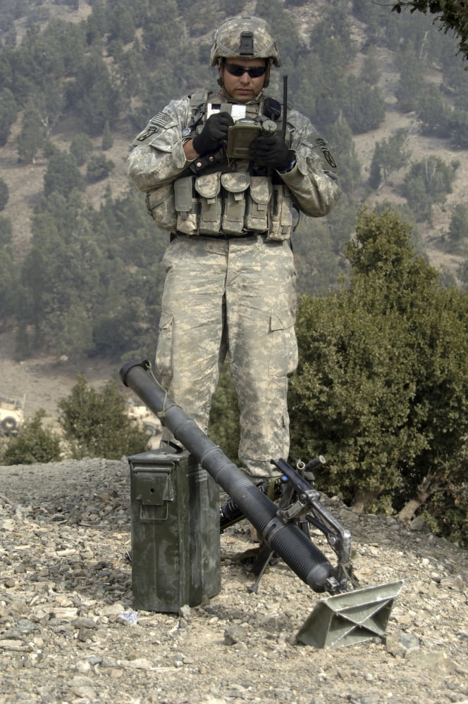 US Army soldier gets information off of a lightweight handheld mortar ballistic computer Canvas Art - Stocktrek Images (23 x 35)