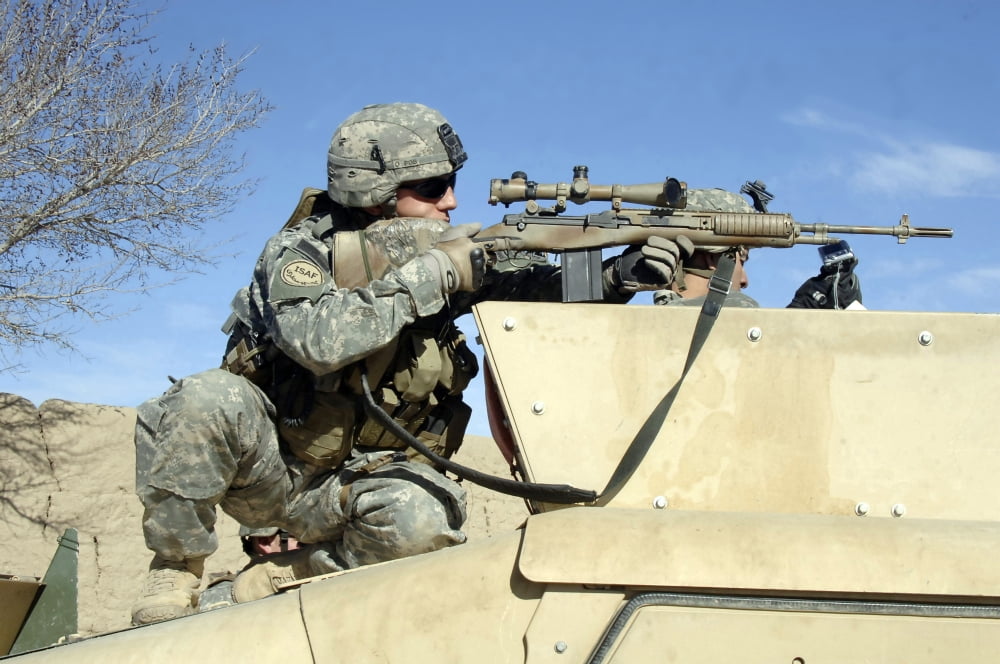 US Army soldier looking through the scope of his rifle onto a mortar range near Ghazni Afghanistan Canvas Art - Stocktrek Images (34 x 23)