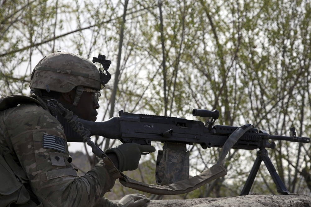 US Army soldier provides security along a road in Afghanistan Canvas Art - Stocktrek Images (35 x 24)