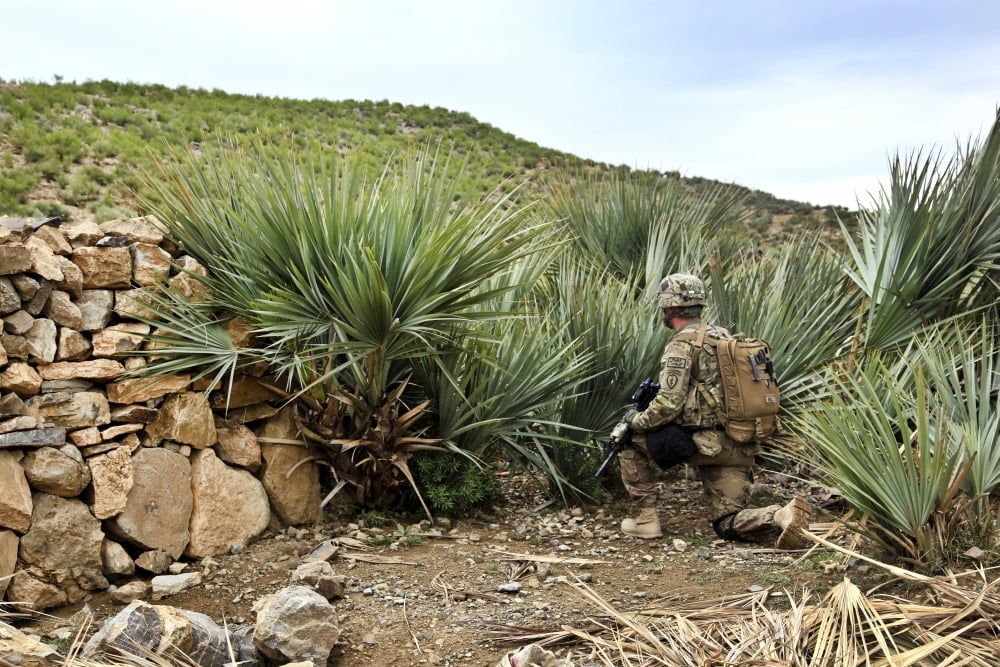 US Army soldier provides security during a patrol in Afghanistan Canvas Art - Stocktrek Images (35 x 23)