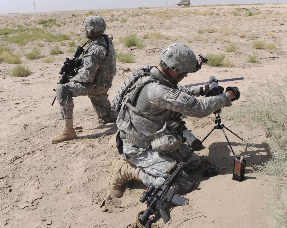 US Army soldier sets up a satellite communications radio Canvas Art - Stocktrek Images (32 x 26)
