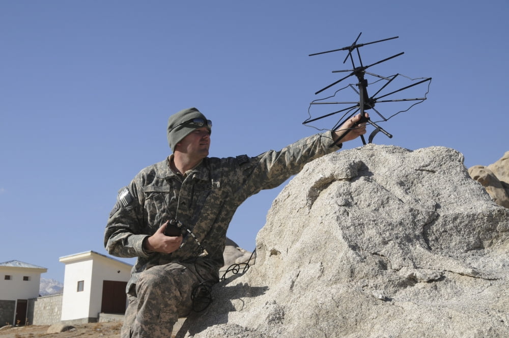US Army soldier sets up a tactical satellite Canvas Art - Stocktrek Images (34 x 23)