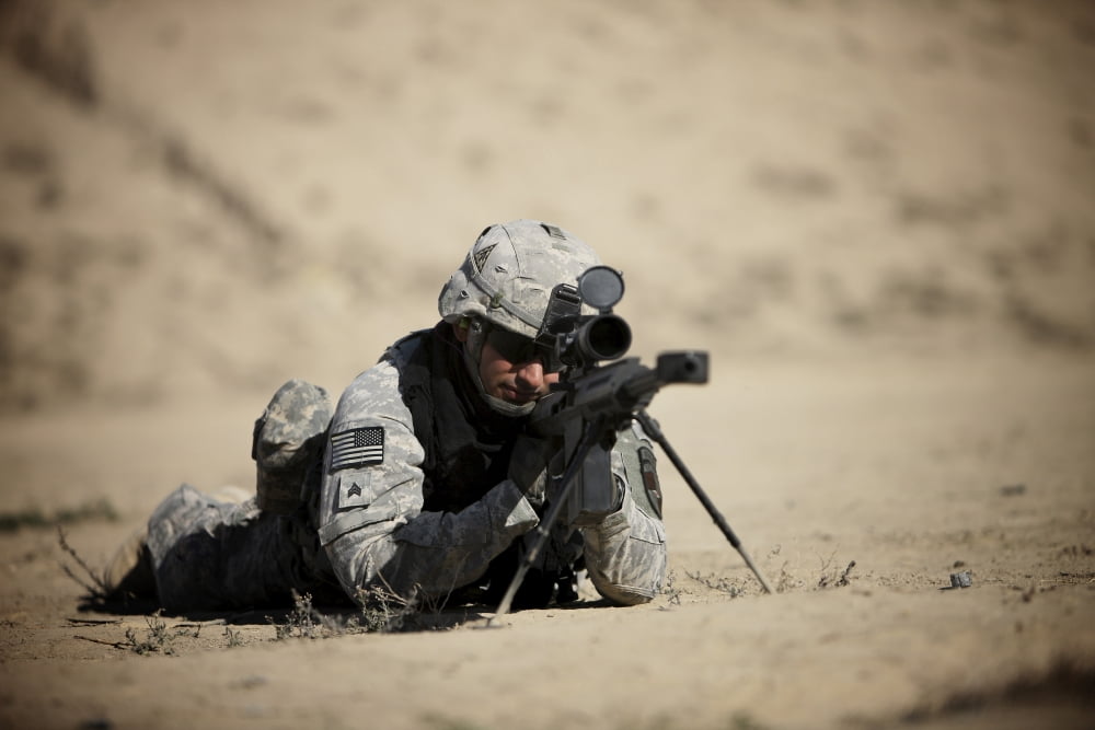 US Army soldier sights in a Barrett M82A1 rifle Canvas Art - Terry MooreStocktrek Images (35 x 24)