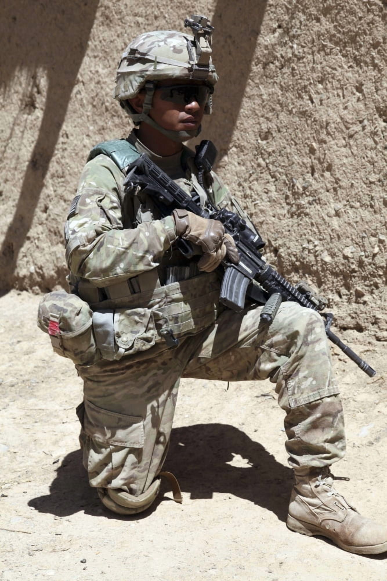 US Army soldier takes a knee while providing security in Afghanistan Canvas Art - Stocktrek Images (23 x 35)