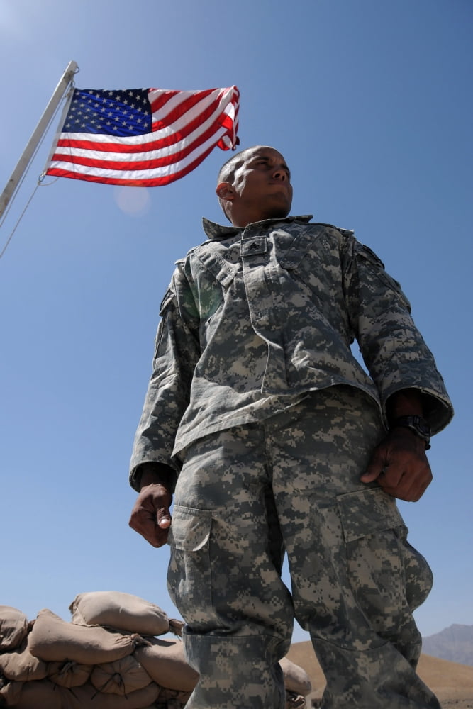US Army soldier taking in the sun at Forward Operating Base Mizan Zabul province Afghanistan Canvas Art - Stocktrek Images (23 x 34)