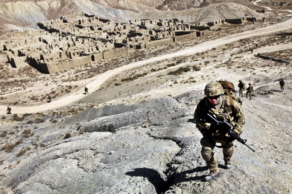 US Army soldiers and Afghan Border Patrolmen provide security in Afghanistan Canvas Art - Stocktrek Images (35 x 23)
