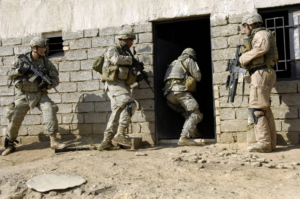 US Army soldiers breaching a house to search for insurgent activities in Zaghiniyat Iraq Canvas Art - Stocktrek Images (34 x 23)