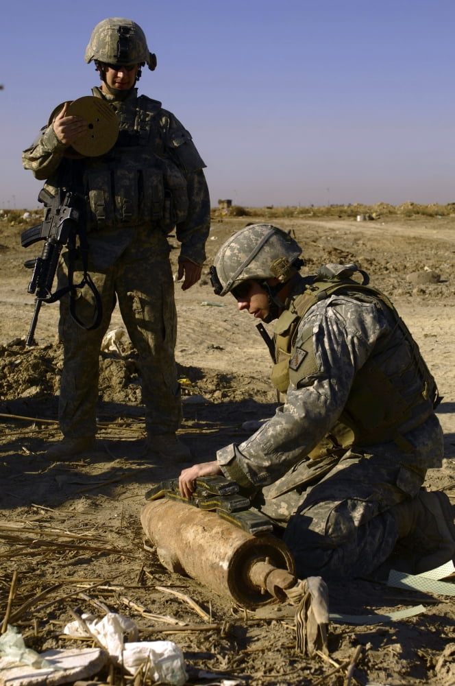 US Army soldiers preparing to detonate unexploded ordinance in Baghdad Iraq Canvas Art - Stocktrek Images (23 x 34)