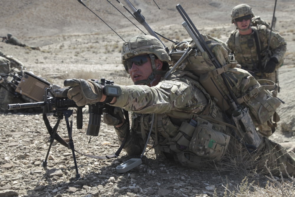 US Army soldiers provide security during a dismounted patrol in Afghanistan Canvas Art - Stocktrek Images (35 x 23)