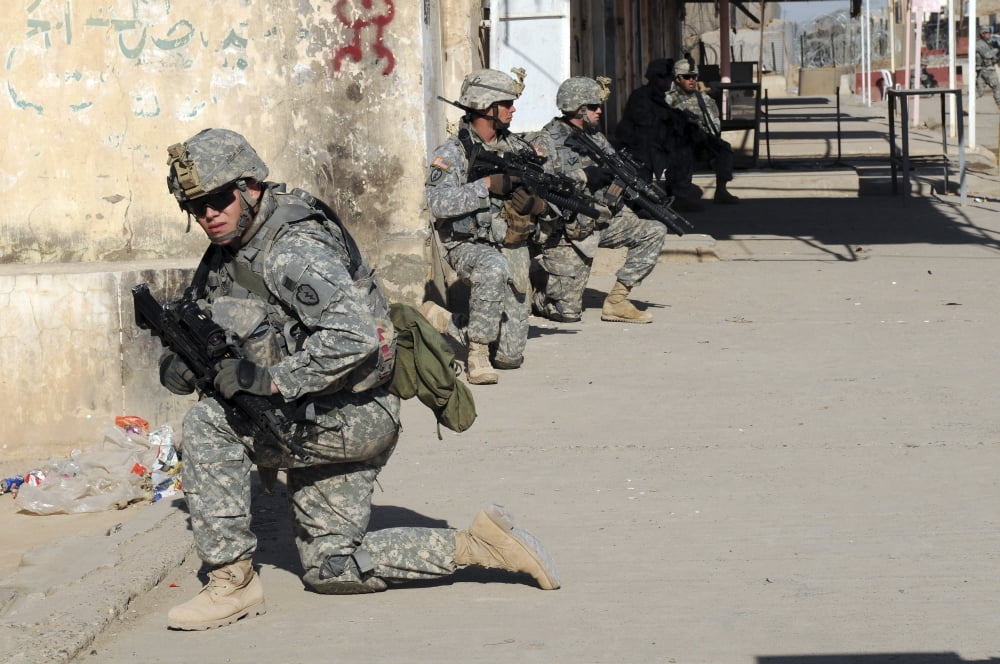 US Army soldiers providing security during a patrol in Siniyah Iraq Canvas Art - Stocktrek Images (34 x 23)