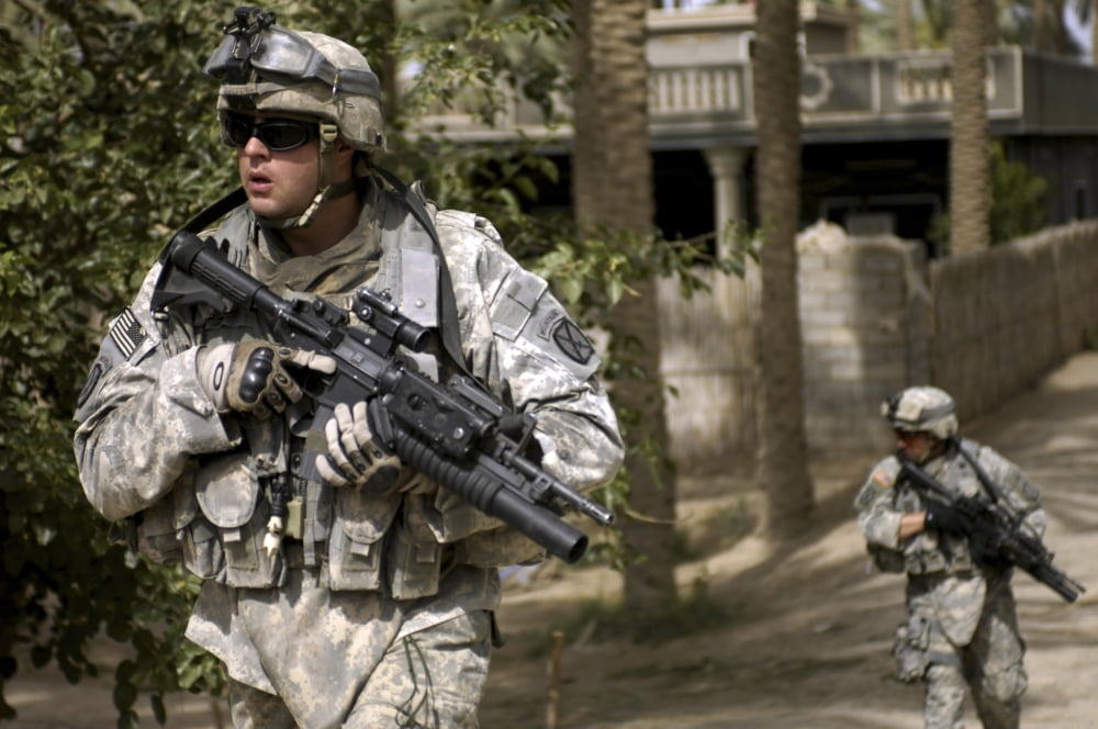 US Army soldiers searching for three missing soldiers in the streets of Yusifiyah Iraq Canvas Art - Stocktrek Images (35 x 23)