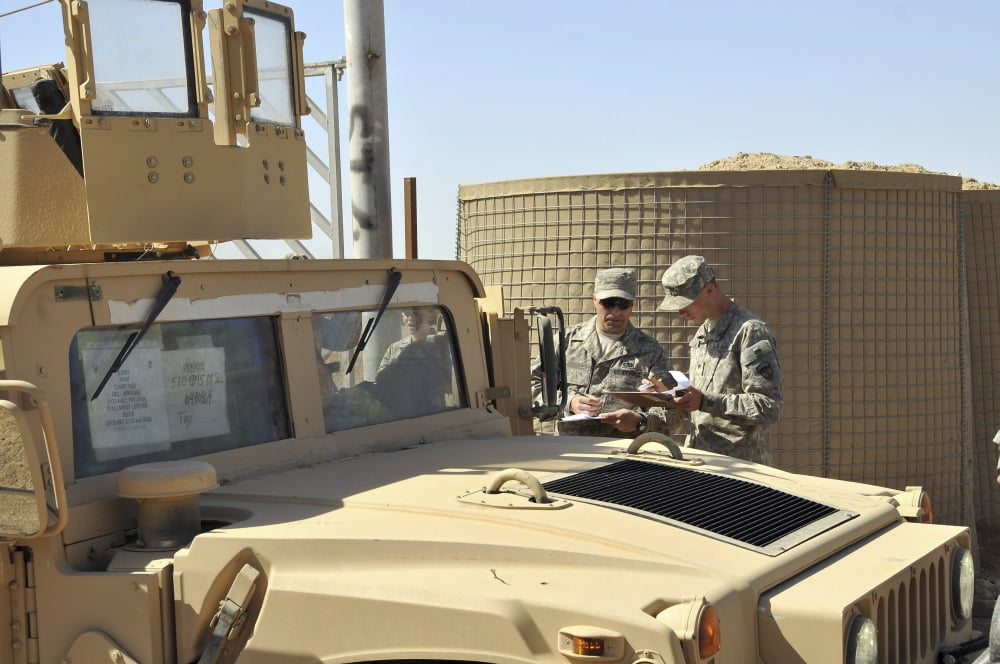 US Army soldiers take accountability of an M1114 HMMWV Canvas Art - Stocktrek Images (34 x 23)