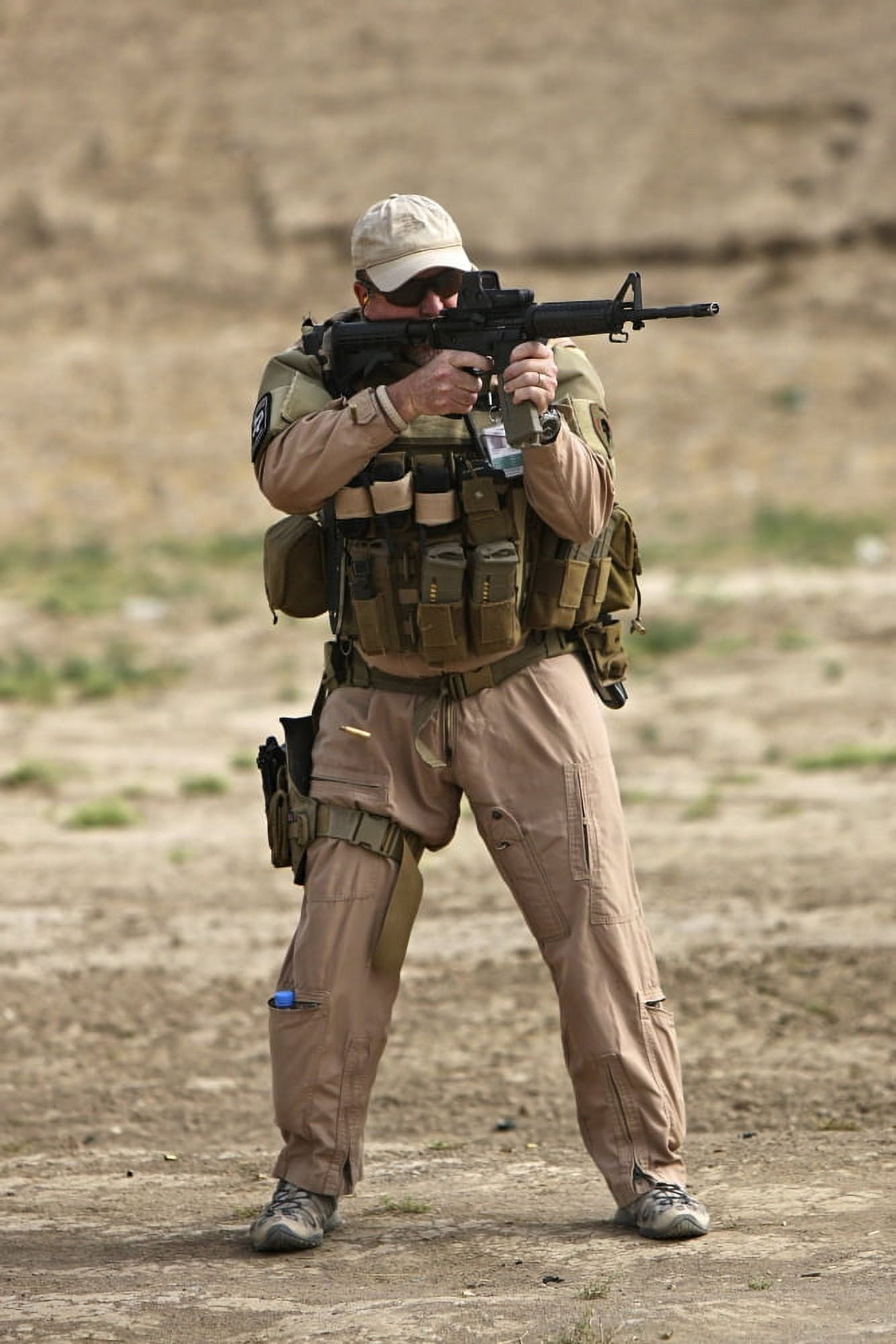 US Contractor firing a M4 Carbine Canvas Art - Terry MooreStocktrek Images (12 x 18)