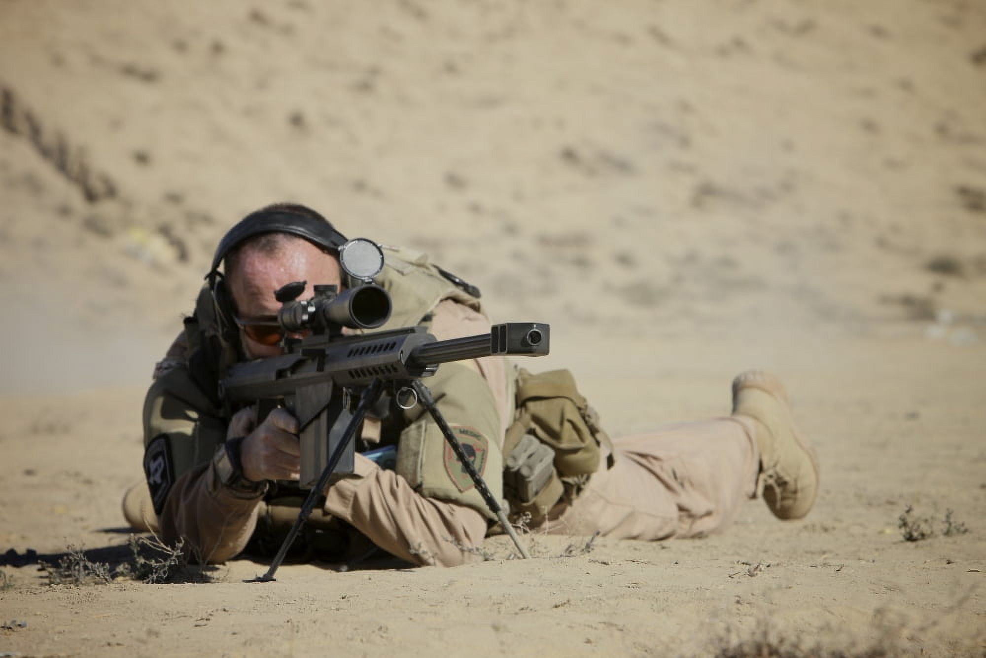 US Contractor sights in a Barrett M82A1 rifle Canvas Art - Terry MooreStocktrek Images (35 x 24)