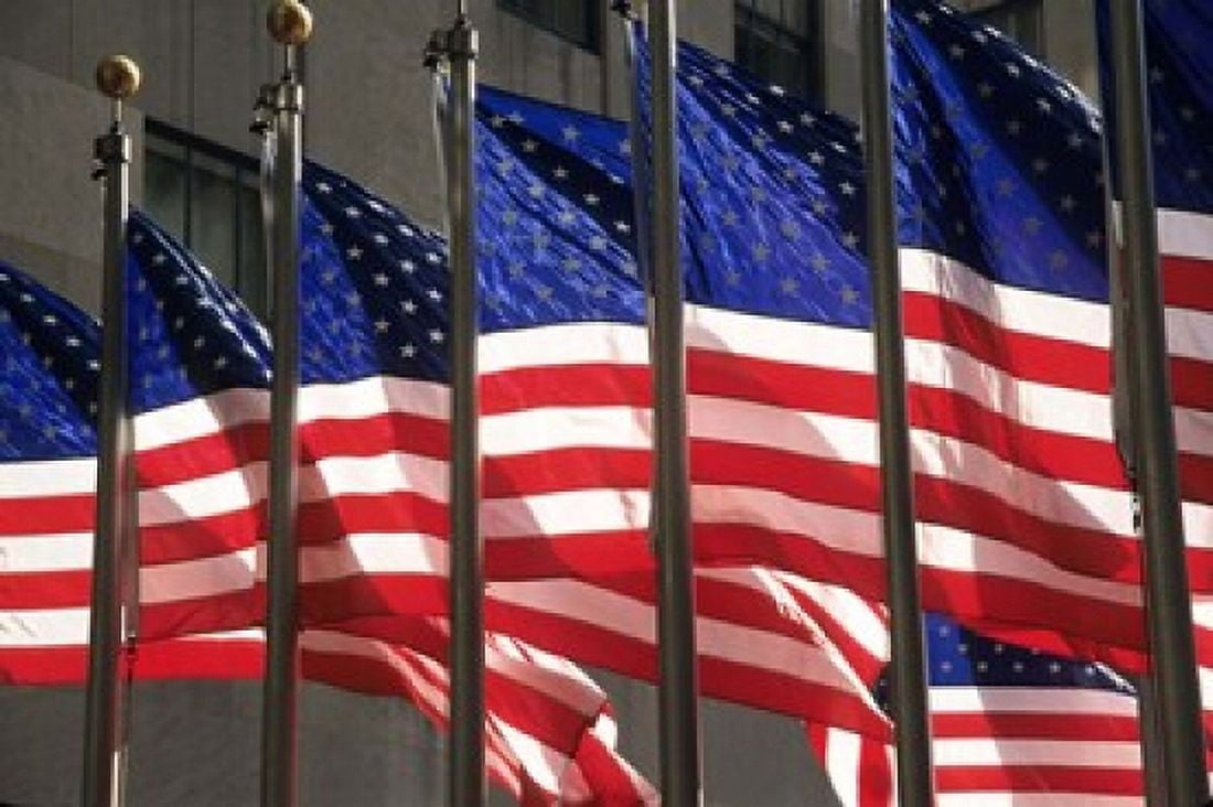US Flags in Rockefeller Plaza New York Canvas Art - David Barnes DanitaDelimont (27 x 18)