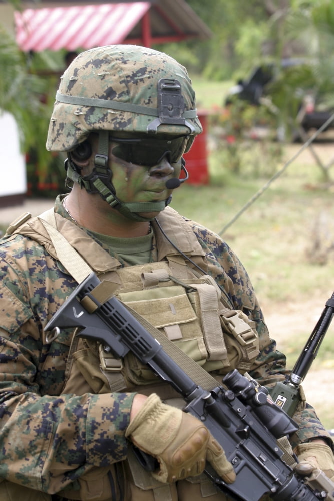 US Marine communicates via radio Canvas Art - Stocktrek Images (24 x 35)