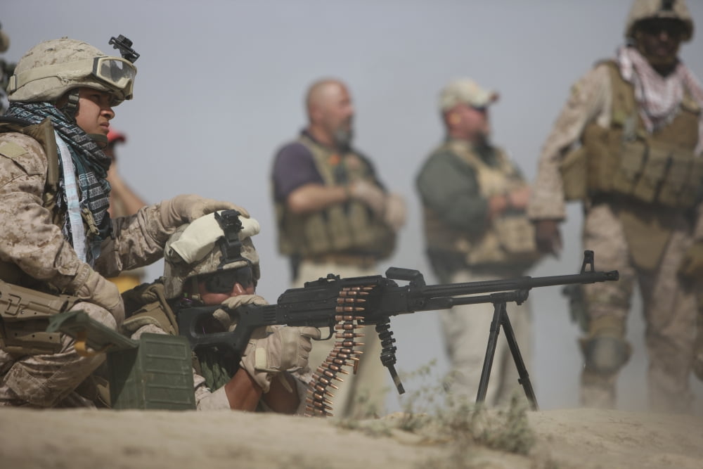 US Marine firing a PK 762mm machine gun Canvas Art - Terry MooreStocktrek Images (35 x 24)