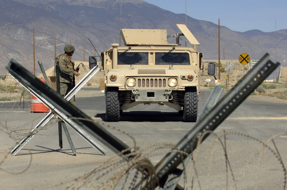 US Marine guards the gate at a training range in Hawthorne Nevada Canvas Art - Stocktrek Images (34 x 23)