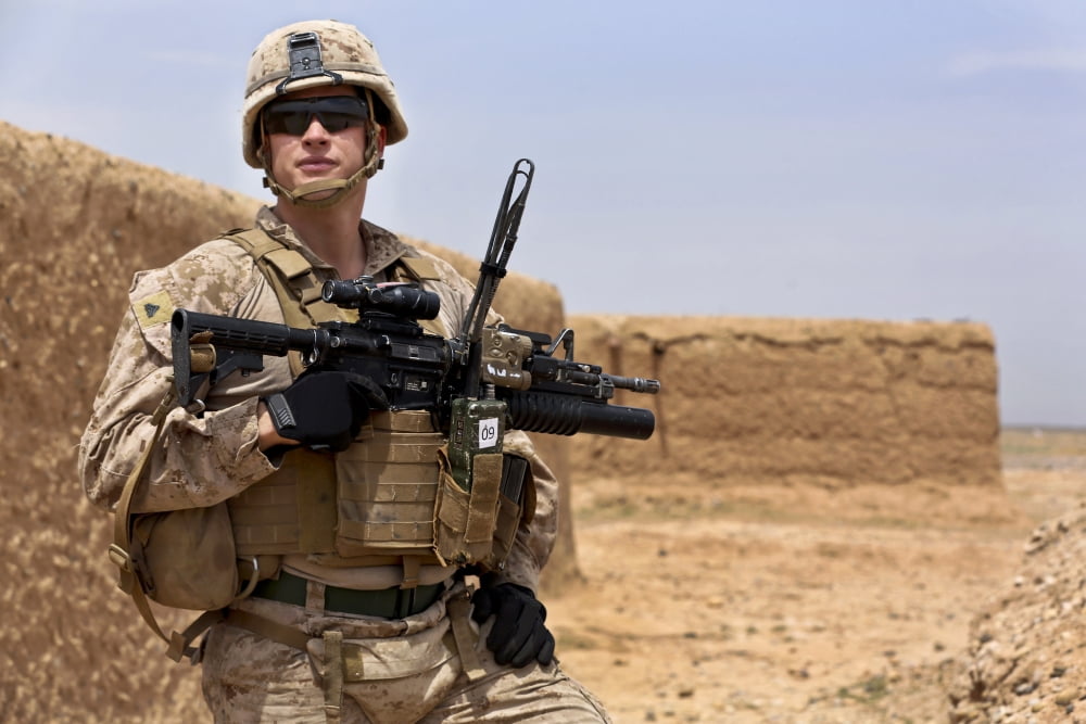 US Marine holds security during a patrol in Afghanistan Canvas Art - Stocktrek Images (34 x 23)