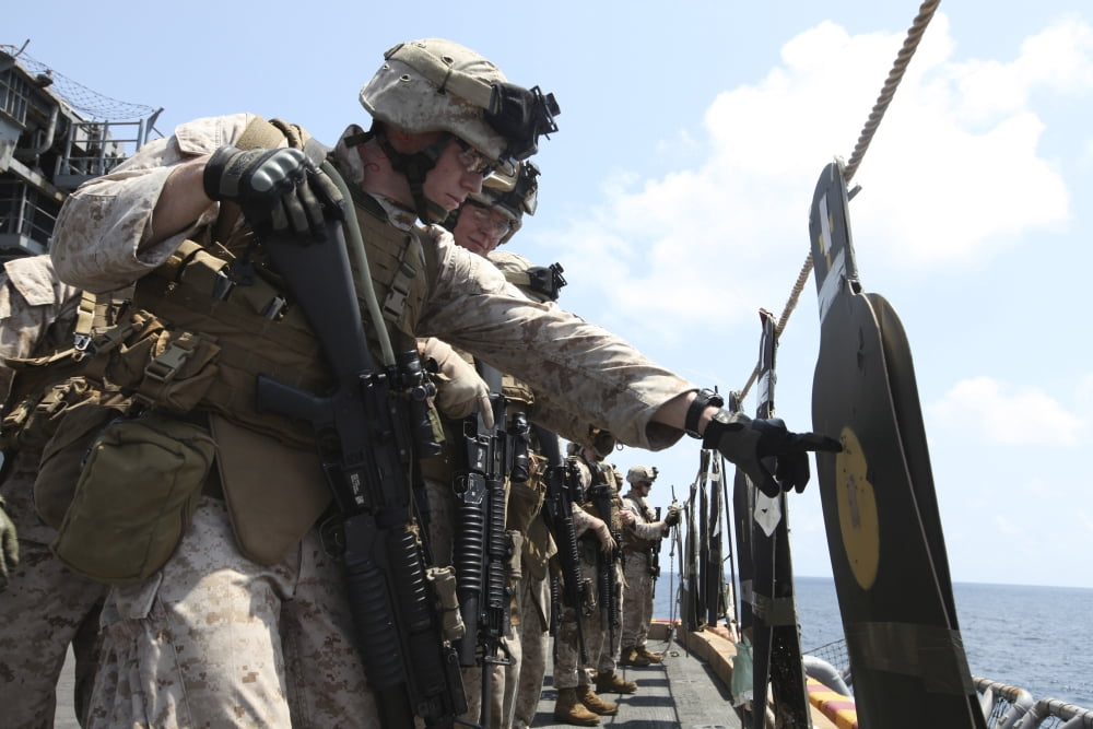 US Marine looks over his target during a combat marksmanship program Canvas Art - Stocktrek Images (34 x 23)