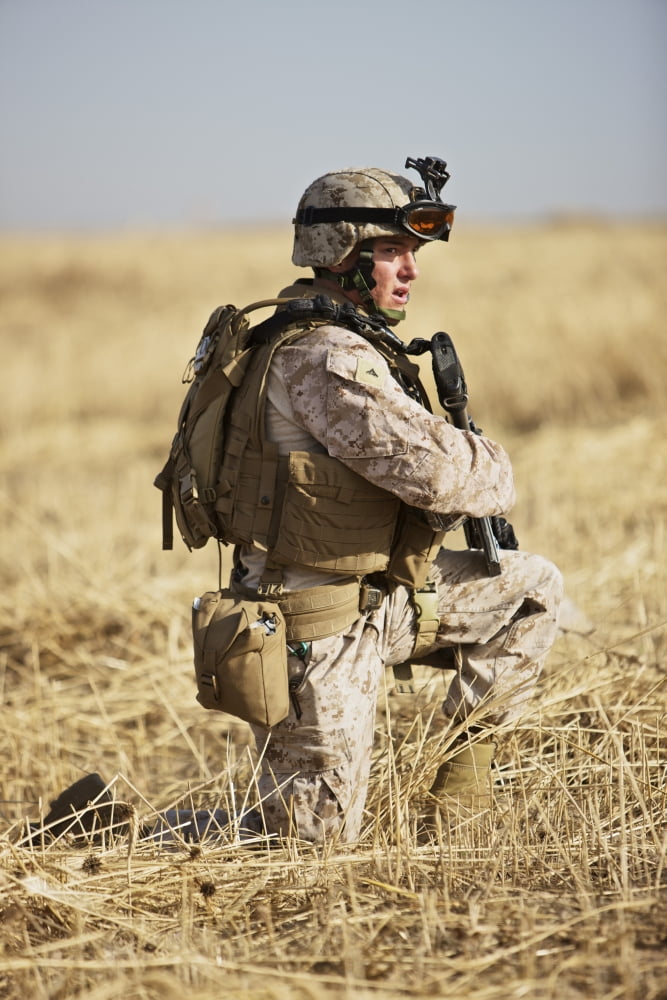 US Marine patrols a wadi near Kunduz Afghanistan Canvas Art - Terry MooreStocktrek Images (23 x 35)