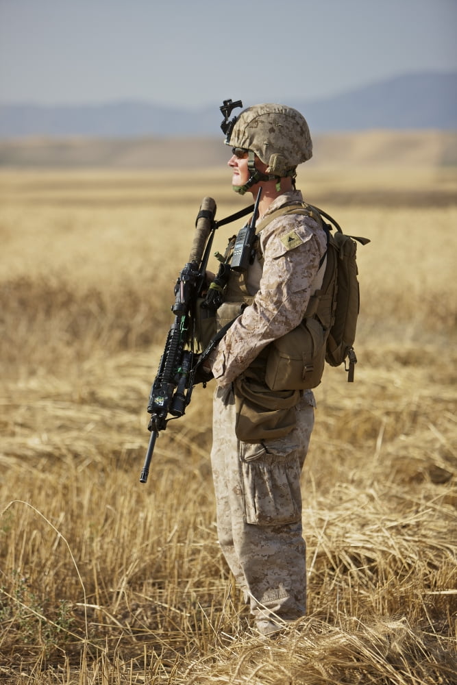 US Marine patrols a wadi near Kunduz Afghanistan Canvas Art - Terry MooreStocktrek Images (23 x 35)