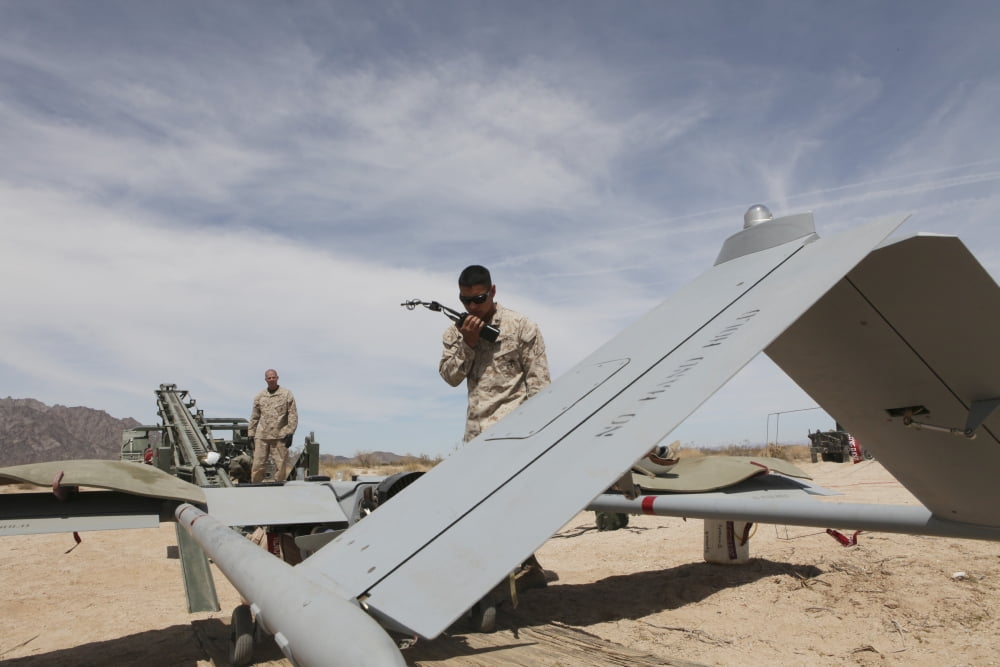 US Marine performs a final preflight check on an RQ-7 Shadow Canvas Art - Stocktrek Images (35 x 23)