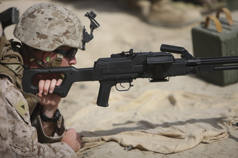 US Marine prepares to fire a PK 762mm machine gun Canvas Art - Terry MooreStocktrek Images (18 x 12)