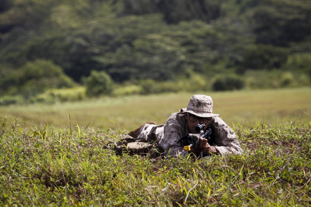 US Marine provides security at the Kahuku Training Area in Hawaii Canvas Art - Stocktrek Images (34 x 23)