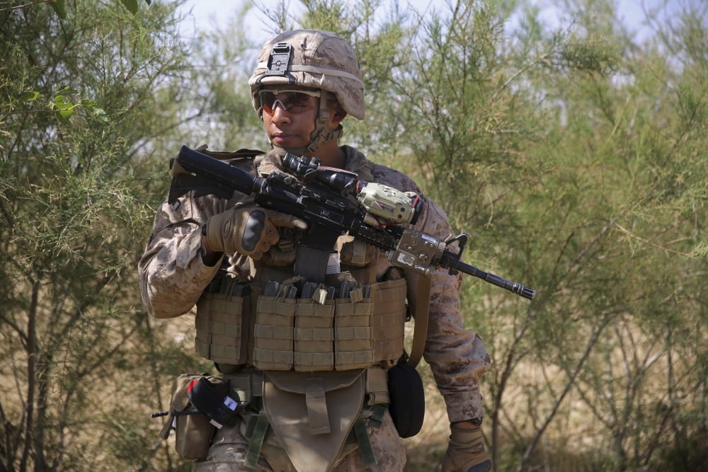 US Marine provides security during a mission in Afghanistan Canvas Art - Stocktrek Images (34 x 23)