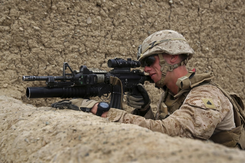 US Marine provides security from behind a mud wall Canvas Art - Stocktrek Images (34 x 23)