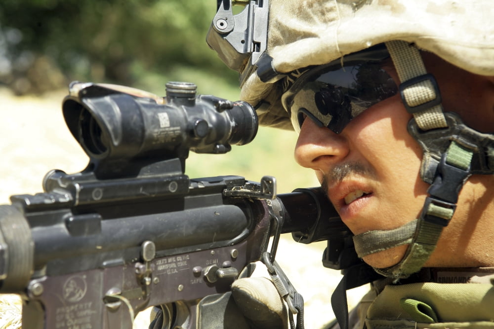 US Marine providing security with rifle during a patrol in Helmand province Afghanistan Canvas Art - Stocktrek Images (34 x 23)