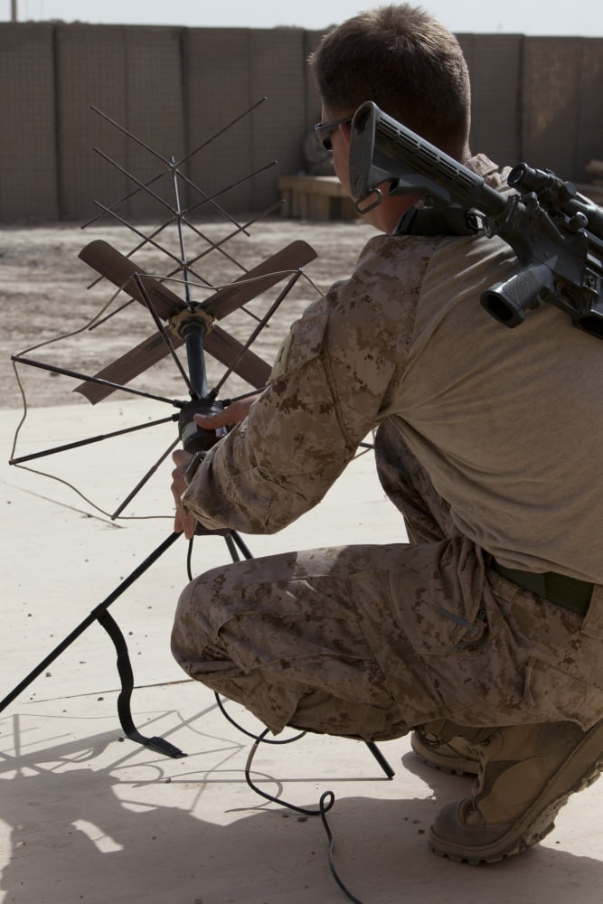 US Marine repositions a satellite communication antenna Canvas Art - Stocktrek Images (23 x 35)