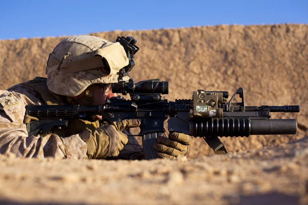 US Marine scans for threats during a firefight in Afghanistan Canvas Art - Stocktrek Images (34 x 23)