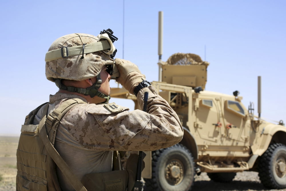 US Marine uses a range finder during a patrol in Afghanistan Canvas Art - Stocktrek Images (34 x 23)