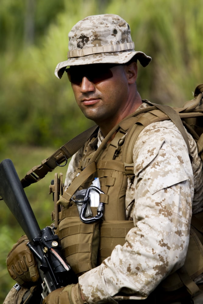 US Marine waits to begin a patrol Canvas Art - Stocktrek Images (23 x 34)