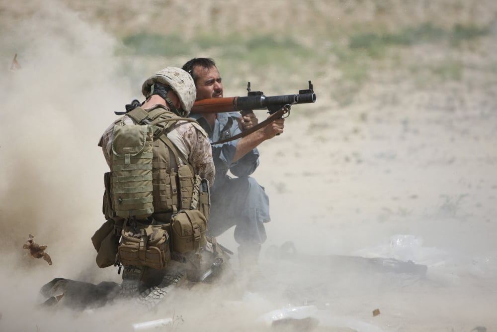 US Marine watches an Afghan Police student fire a RPG-7 Canvas Art - Terry MooreStocktrek Images (35 x 24)