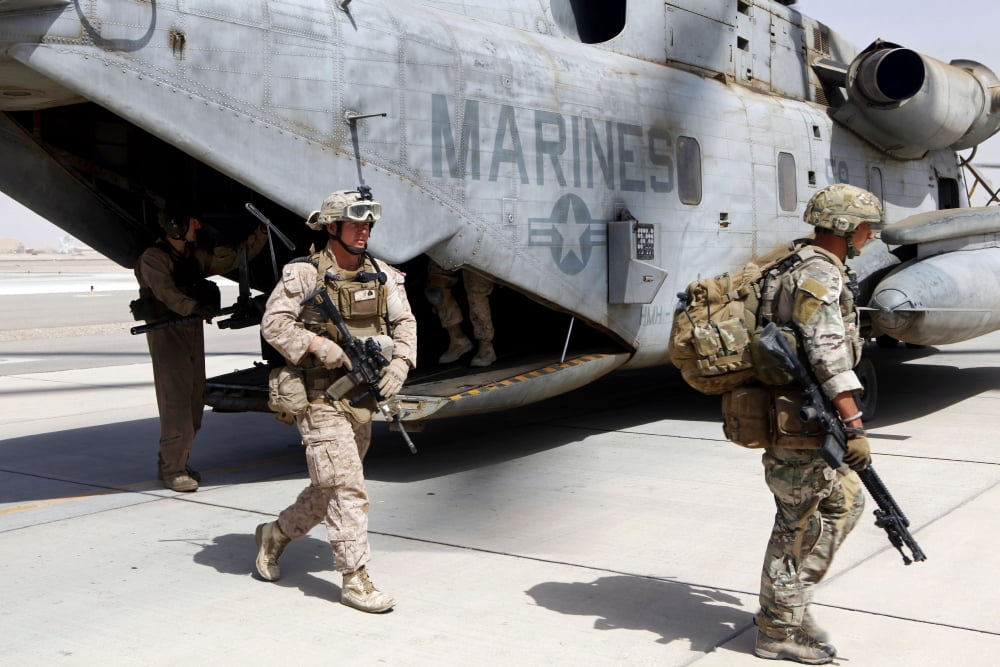 US Marines and British soldiers exit a CH-53E Super Stallion Canvas Art - Stocktrek Images (35 x 23)