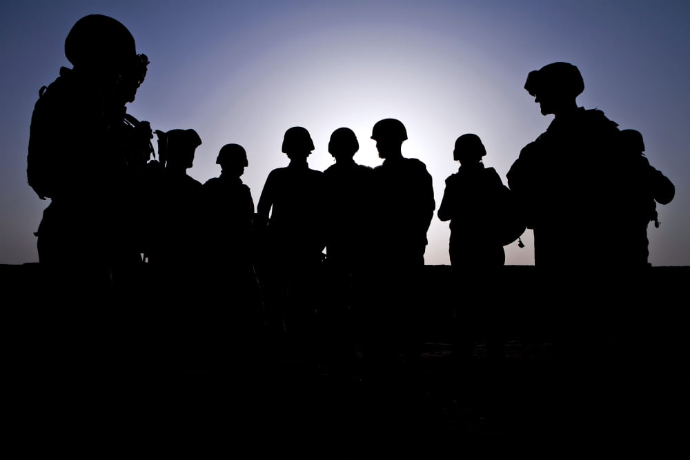 US Marines and civilian contractors gather around for a briefing Canvas Art - Stocktrek Images (35 x 23)