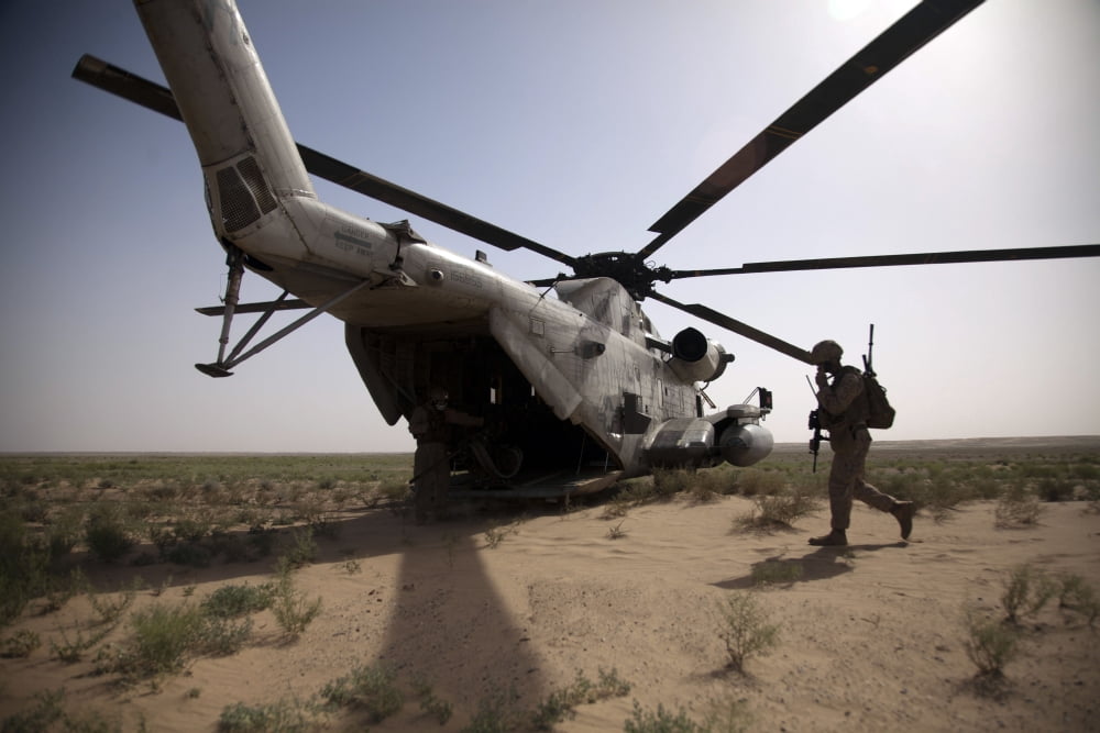 US Marines board a CH-53D Sea Stallion helicopter in Afghanistan Canvas Art - Stocktrek Images (35 x 23)